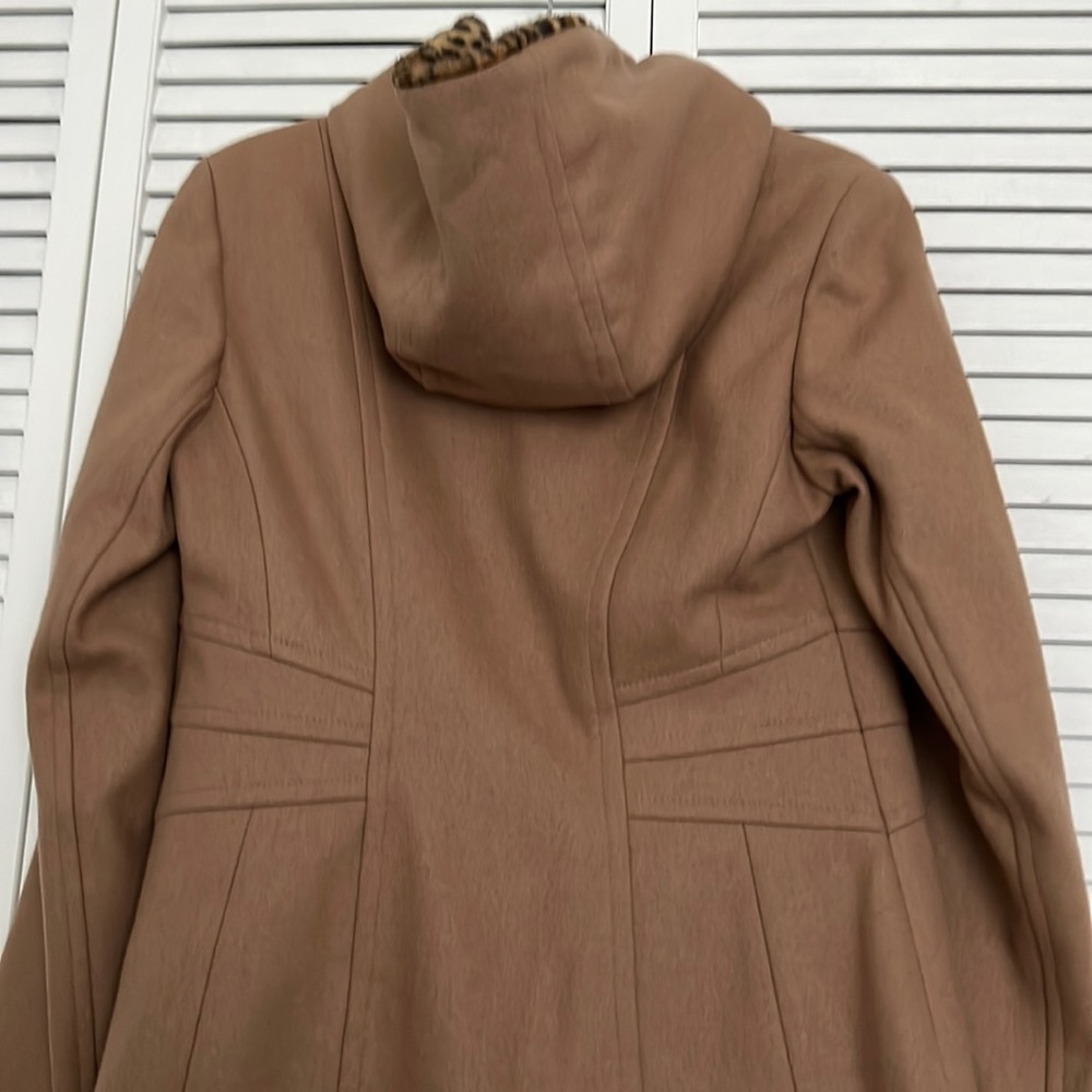 Never worn and climb wool blend hooded car coat. Animal print inside hood.